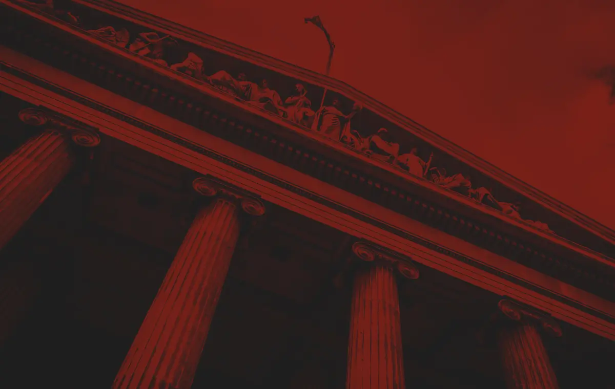 Courthouse columns and pediment, in the firm’s red